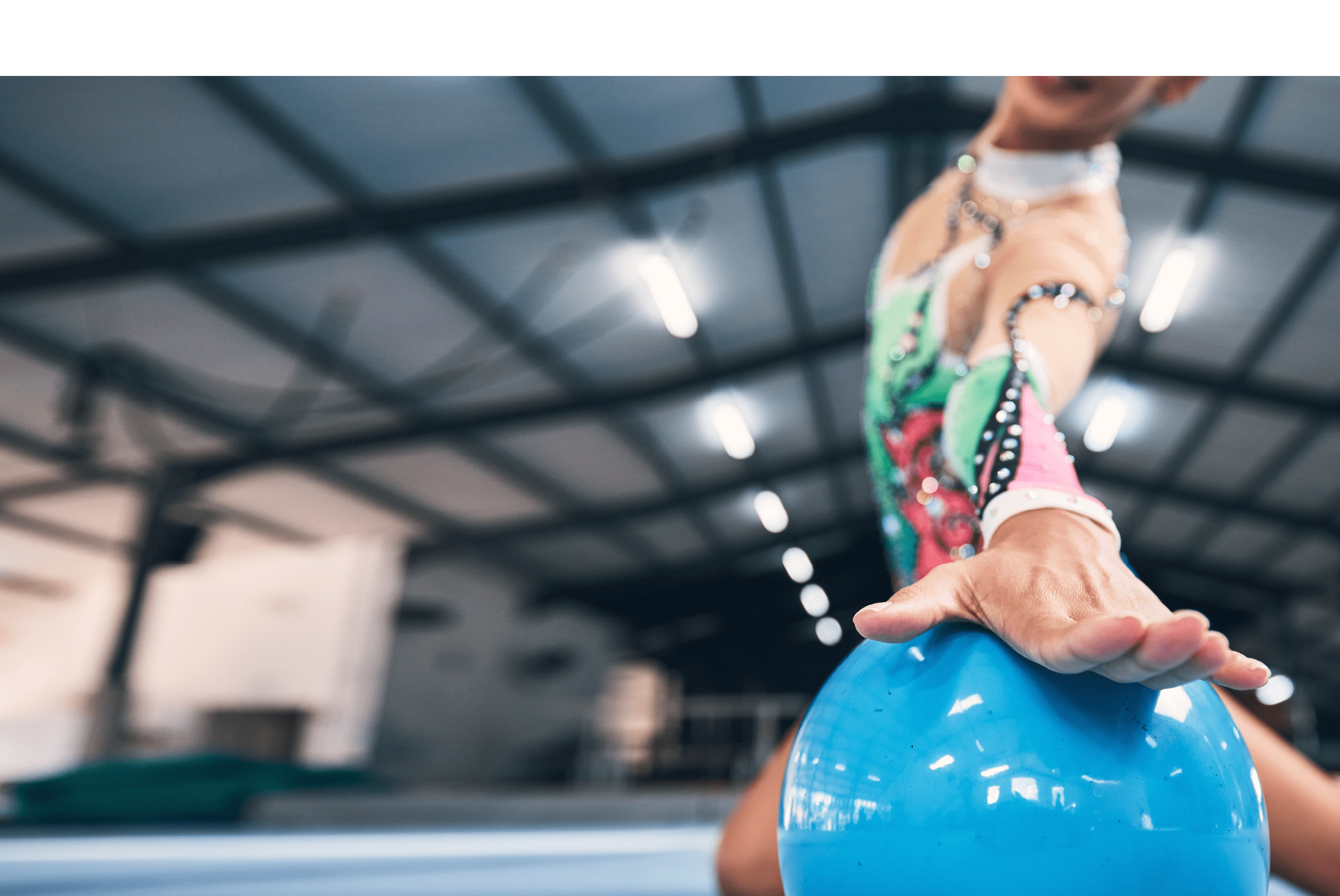 Woman hands, gymnastics and ball for performance, elegant training and dancer in sports arena. Closeup female, rhythmic movement and dancing for creative talent, solo concert and agility in action